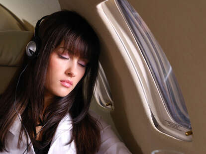 Woman Sleeping on Plane