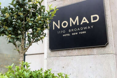 NoMad sign and greenery