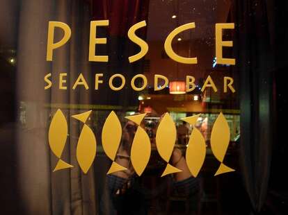 The sign on the door at Pesce