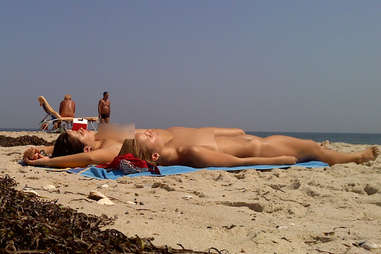 naked women sunbathe