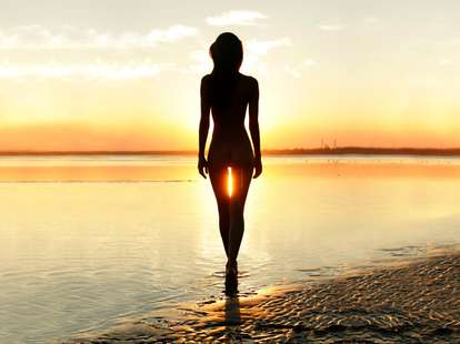 naked woman in the sunset