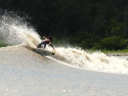 River surfing the Pororoca Bore on the Amazon River.