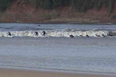 River surfing the Severn Bore near Gloucester, England.