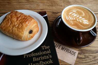 Cafe Myriade coffee, pastry, magazine and business card