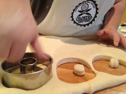 Glazed Donut Works donuts being made