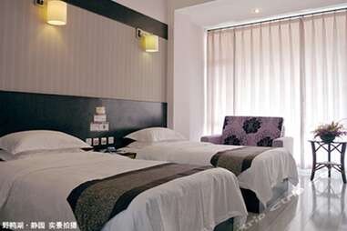 Bedrooms at Wild Duck Lake Resort in Kunming, China.