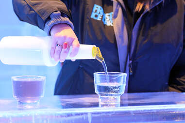 Bartender pouring drink at Frost Ice Bar