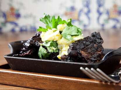 small plate charred pig at the purple pig in chicago thrillist