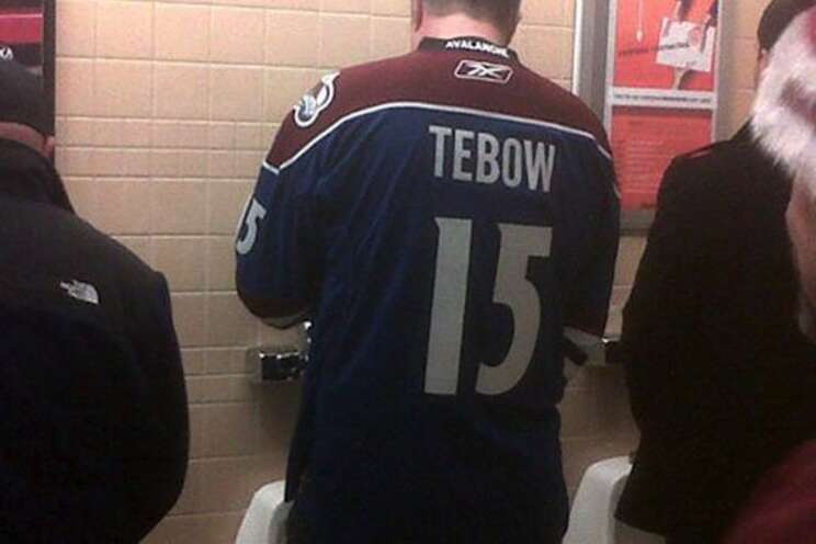 Tebow dons Broncos jersey for 1st time - The San Diego Union-Tribune