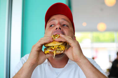 Jason from P Terry's eating a burger