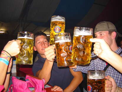 people celebrating with German beer