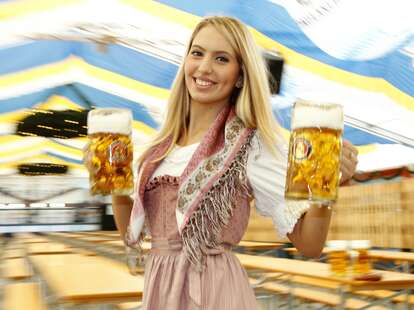 Pretty lady holding beers