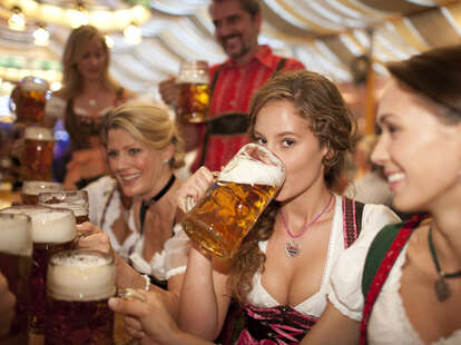 women drink beer at oktoberfest