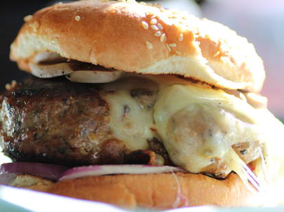 A close up of a burger