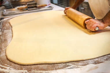 Rolling out the dough for monte cristo sandwiches at Donut Bar in downtown San Diego.