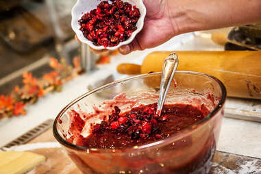 Making the cran raspberry sauce to go in the monte cristo sanwiches at Donut Bar in downtown San Diego.