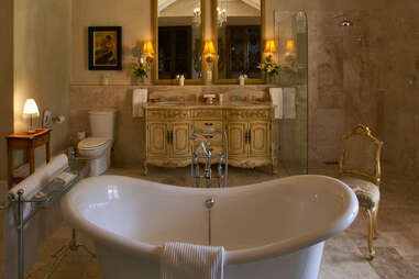 standing bath with ornate counter